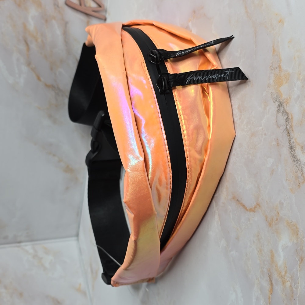 Free people Slim Fold Runner Bag holographic orange new without tag